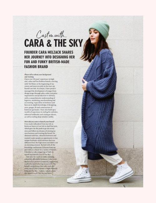 Model pictured wearing navy blue long cardigan in a Knitting Magazine full page article