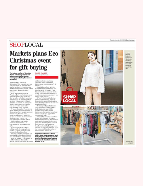 Model pictured wearing cream roll neck jumper in a Brent & Kilburn Times article on eco gift buying